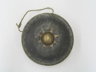 Gong, 20th century
Miao culture; China
Bronze, paint and fiber; 8 × 8 × 2 in.
2019.22.30
An…
