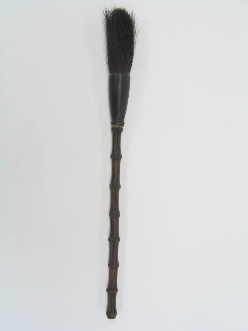 Calligraphy Brush, 19th Century
Han culture; China
Wood and hair; 1 1/8 × 1 1/2 × 14 3/4 in.
…