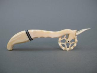 Pie Crimper, 19th Century
Unknown artist (American); North America
Sperm whale ivory and bale…