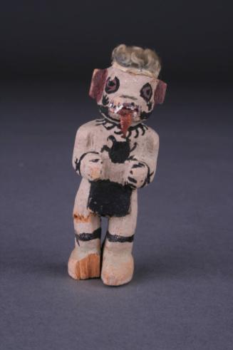 Dog Katsina, c. 1940
Hopi culture; Arizona, United States
Cottonwood, pigment, wool and cotto…