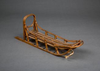 Dog Sled Model, early 20th Century
Inupiaq culture; Alaska
Wood, fiber and leather; 6 1/8 x 3…