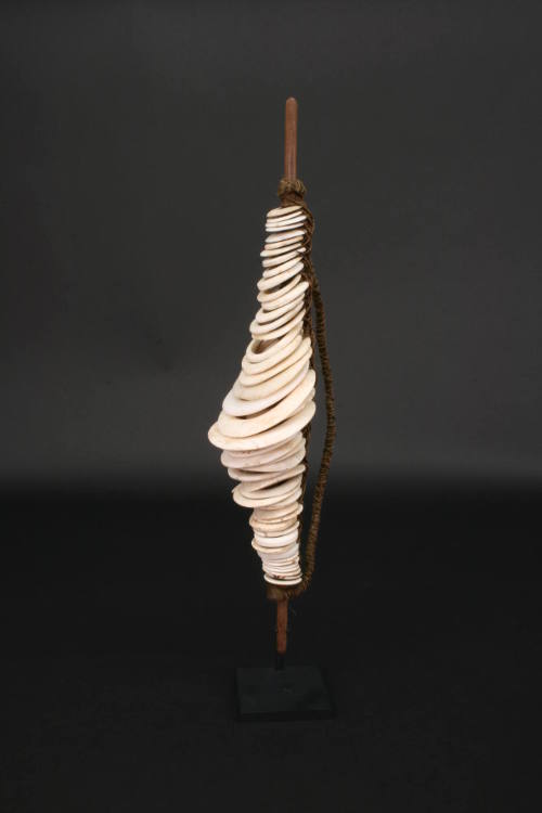 Shell Money, 20th Century
Lumi culture
Shell, wood and rope; 26 x 5 1/4 x 9 in.
2014.11.1
G…