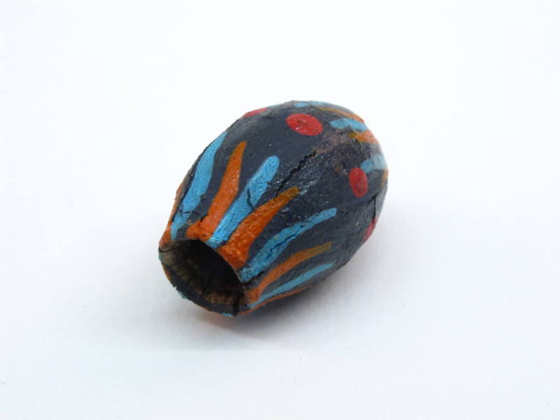 Bead, late 20th Century
Aboriginal culture; Australia
Dried gum fruit pod and acrylic paint; …