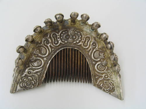 Comb, 20th Century
Dong culture; Guizhou Province, China
Silver and wood; 11 1/2 x 4 7/8 x 3 …