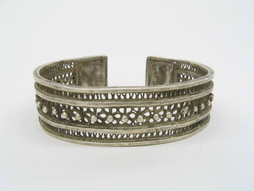 Bracelet, 20th Century
Miao culture; probably Guizhou Province, China
Silver; 7/8 x 3 1/8 in.…