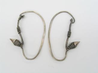 Earrings, 20th Century
Miao culture; probably Guizhou Province, China
Silver; 2 × 2 3/4 in.
…