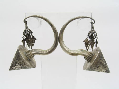 Earrings, 20th Century
Miao culture; probably Guizhou Province, China
Silver; 3 1/4 × 5 1/2 i…