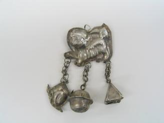 Ornament, 20th Century
Miao culture; probably Guizhou Province, China
Silver; 1 1/2 x 2 3/4 i…