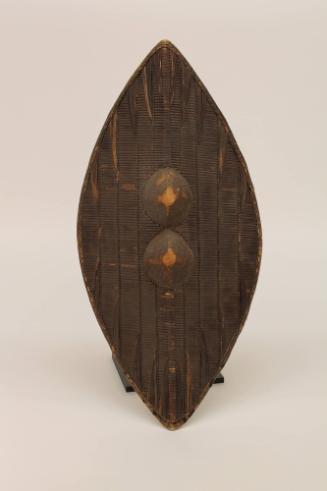 Basketry Shield with Wood Bosses, early 20th Century
Ganda culture; Buganda Kingdom, Central R…
