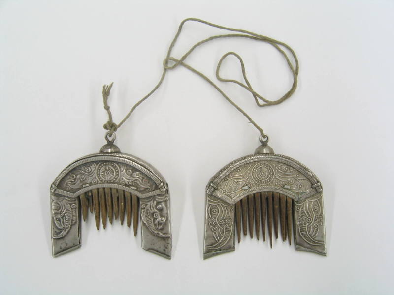 Combs, 20th Century
probably Miao culture; probably Guizhou Province, China
Silver and wood; …