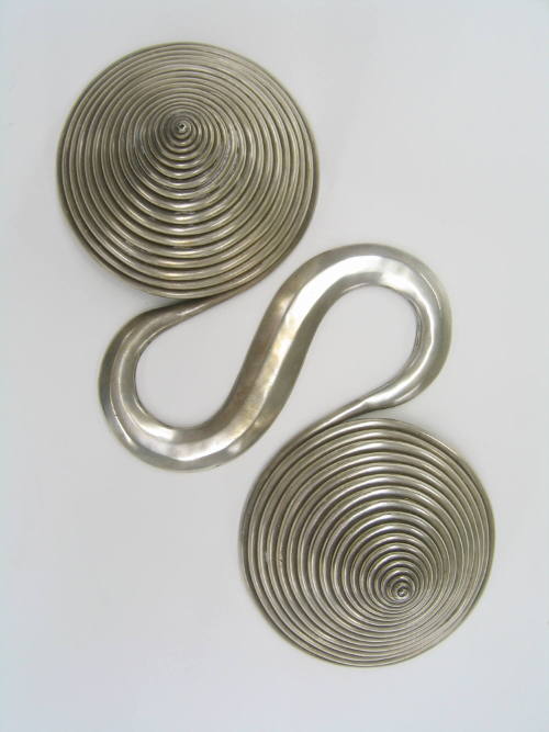 Counterweight, 20th Century
Miao culture; Guizhou Province, China
Silver; 12 x 3 1/2 x 6 in.
…