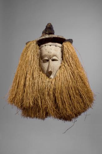 Initiation Mask, 20th Century 
Bayaka people; Democratic Republic of the Congo
Wood, raffia a…