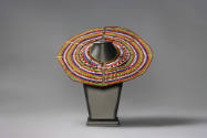 Collar, 20th Century
Maasai culture; Tanzania or Kenya, Africa
Leather, metal, and glass; 13 …