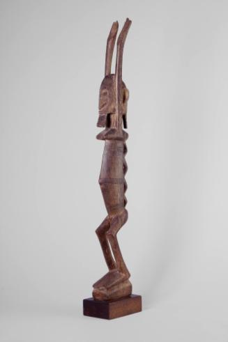 Figure with Raised Arms, 20th Century
Dogon culture; Mali
Wood; 44 x 3 x 5 3/4 in.
96.54.1
…