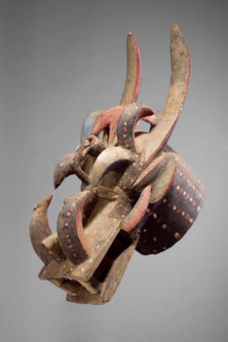 Helmet "Firespitter" Mask, mid 20th Century
Senufo people; Ivory Coast
Wood and pigment; 15 1…