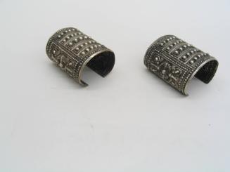 Cuffs, 20th Century
Miao culture; probably Guizhou Province, China
Silver; 3 3/8 x 7 in.
200…