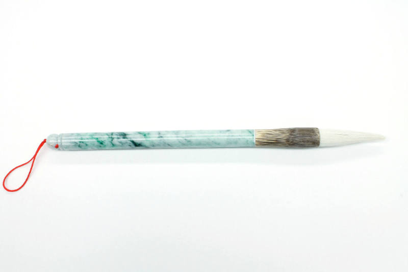 Calligraphy Brush, early 21st Century
China
Jade, bamboo, thread and hair; 11 1/4 × 3/4 in.
…