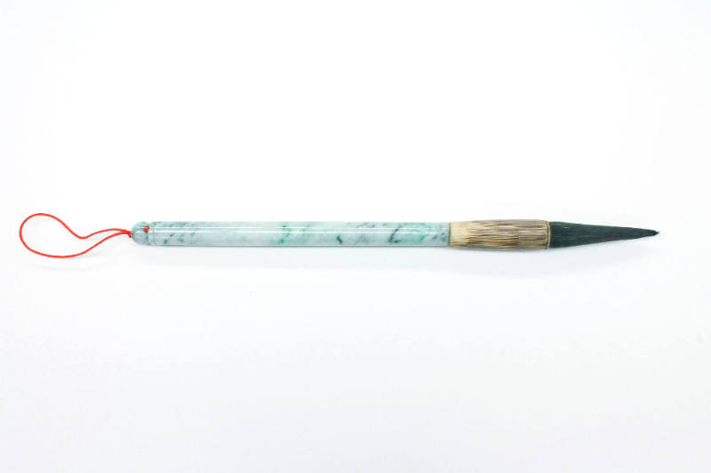 Calligraphy Brush, early 21st Century
China
Jade, bamboo, thread and hair; 11 1/4 × 3/4 in.
…