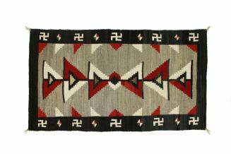 Double Saddle Blanket, c. 1920
Navajo
Wool; 33 × 58 in.
2014.10.5
Gift of Dennis J. Aigner