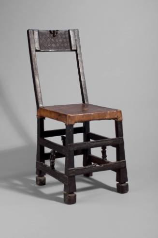 Chair, early 20th-mid 20th Century
Chokwe people; Republic of Angola
Wood and leather;  25 1/…