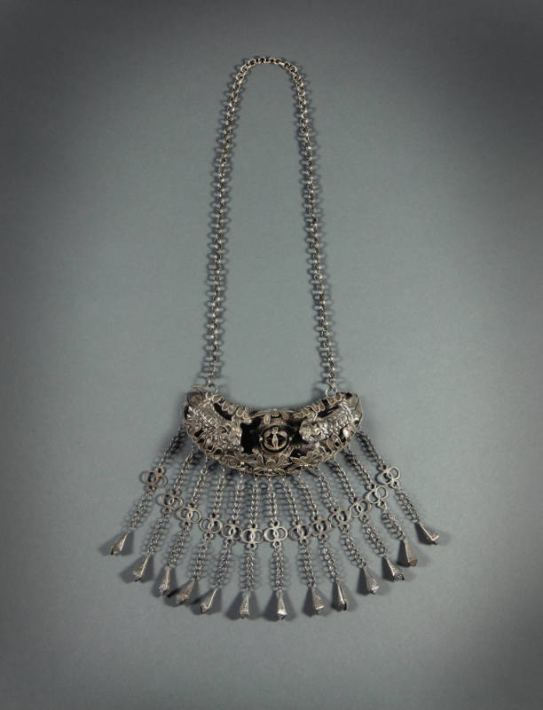 Breast Ornament with Chain, 20th Century
Dong culture; Guizhou Province, China
Silver; 18 × 6…