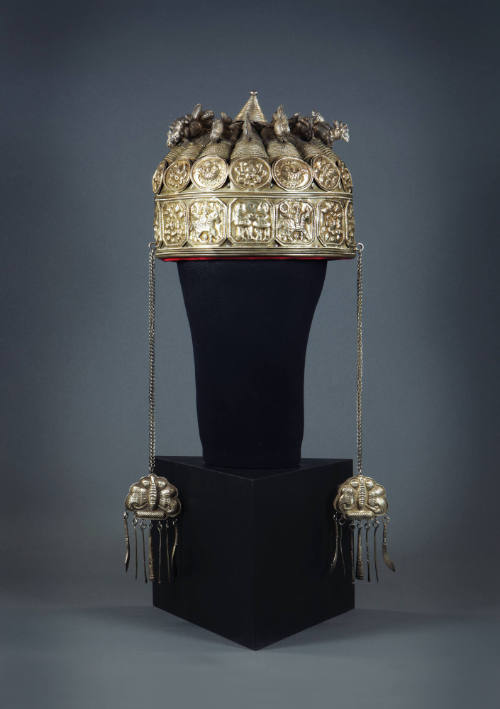 Festival Crown, 20th Century
Miao culture; Guizhou Province, China
Silver and cloth; 20 × 8 1…