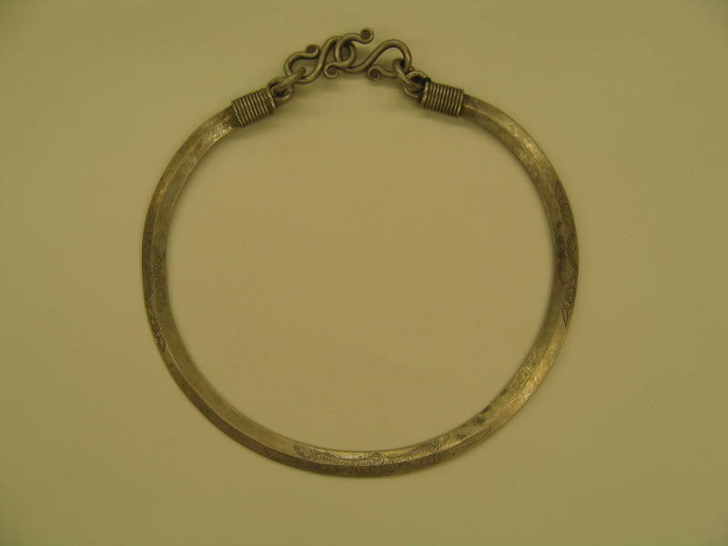 Neck Ring with Decorative Clasp, 20th Century
Miao culture; probably Guizhou Province, China
…