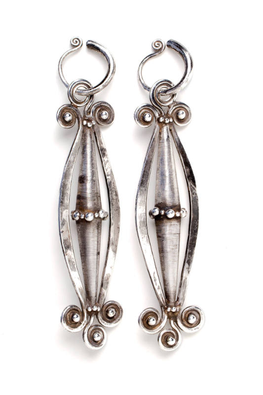 Oblong Earrings with Coiled Ends, 20th Century
Miao culture; Guizhou Province, China
Silver; …