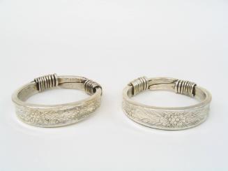 Bracelets with Incised Floral Designs, 20th Century
Miao culture; Guizhou Province, China
Sil…