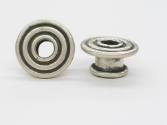 Circular Ear Spools, 20th Century
Miao culture; Guizhou Province, China
Silver; 1 3/8 × 5/8 i…