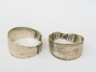 Wide Silver Bracelets, 20th Century
Miao culture; Guizhou Province, China
Silver; 2 7/8 in.
…