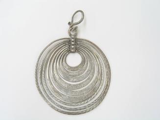Earring with Nine Concentric Rings, 20th Century
Li culture; Hainan Province, China
Silver; 5…