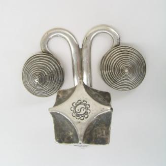 Counterweight Back Ornament with Yin-Yang Symbols, 20th Century
Miao culture, Guizhou Province…