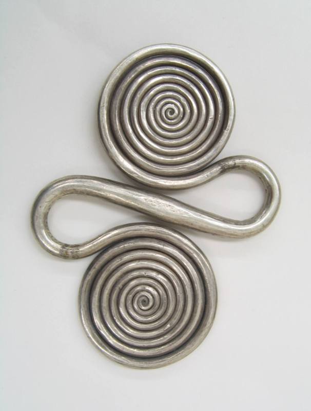 S-Shaped Counterweight, 20th Century
Miao culture; Guizhou Province, China
Silver; 4 1/4 × 3 …