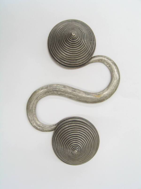 S-Shaped Counterweight, 20th Century
Miao culture; Guizhou Province, China
Silver; 7 1/8 × 4 …