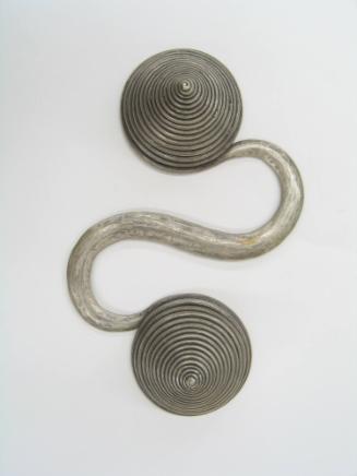 S-Shaped Counterweight, 20th Century
Miao culture; Guizhou Province, China
Silver; 7 1/8 × 4 …