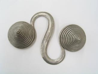 S-Shaped Counterweight, 20th Century
Miao culture; Guizhou Province, China
Silver; 6 1/4 × 4 …