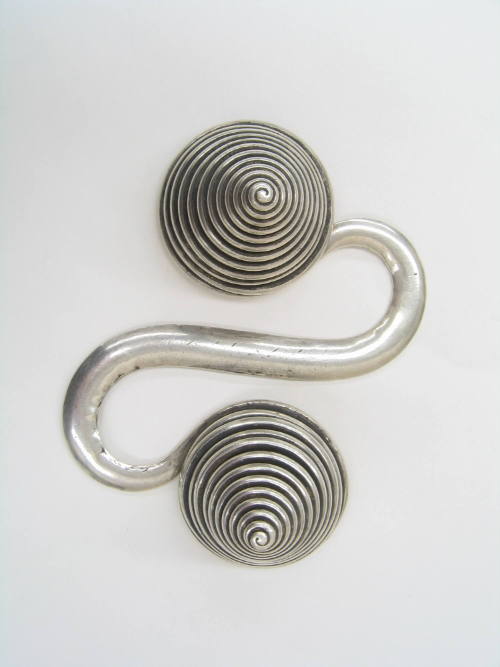 S-Shaped Counterweight, 20th Century
Miao culture; Guizhou Province, China
Silver; 5 5/8 × 4 …