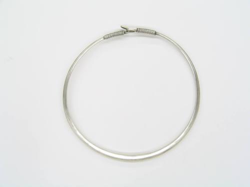 Neck Ring with Coiled Accents, 20th Century
Miao culture; Guizhou Province, China
Silver; 8 ×…