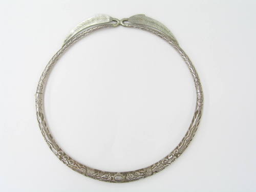 Neck Ring with Leaf Clasp, 20th Century
Miao culture; Guizhou Province
Silver; 8 1/2 × 8 5/8 …