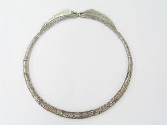 Neck Ring with Leaf Clasp, 20th Century
Miao culture; Guizhou Province
Silver; 8 1/2 × 8 5/8 …