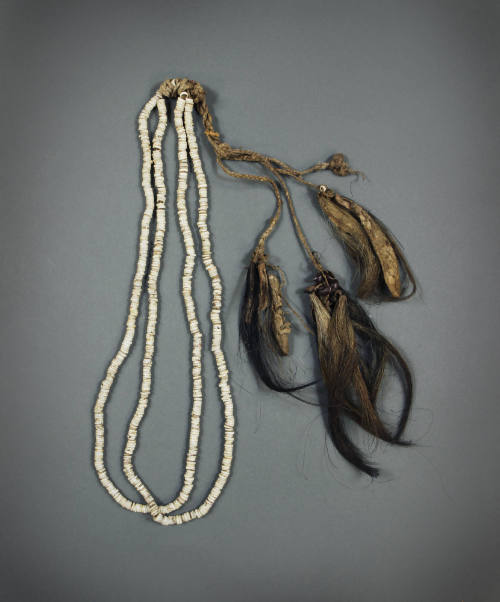 Shell Necklace with Pig Tails, mid 19th to early 20th Century
Papua New Guinea, Melanesia
She…