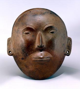 Mask, 200 BCE - 300 CE
Colima Shaft Tomb peoples; Colima, Mexico
Ceramic; 8 1/4 × 7 3/8 × 2 3…
