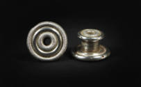 Circular Ear Spools, 20th Century
Miao culture; Taijiang County, Guizhou Province, China
Silv…