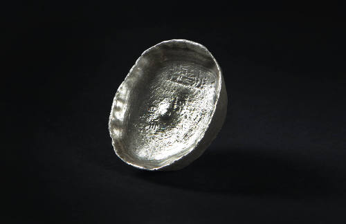 Solid Silver Currency Object, 20th Century
Miao culture; Guizhou Province, China
Silver; 1 1/…