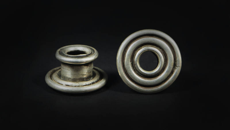 Circular Ear Spools, 20th Century
Miao culture; Guizhou Province, China
Silver; 1 3/8 × 5/8 i…