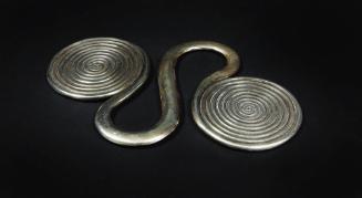 S-Shaped Counterweight, 20th Century
Miao culture; Guizhou Province, China
Silver; 6 3/4 × 4 …