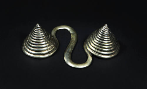 S-Shaped Counterweight, 20th Century
Miao culture; Guizhou Province, China
Silver; 6 3/8 × 4 …