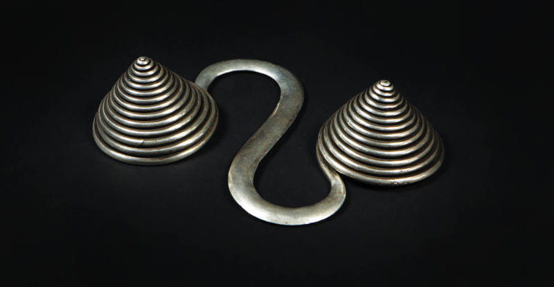S-Shaped Counterweight, 20th Century
Miao culture; Guizhou Province, China
Silver; 6 5/8 × 4 …