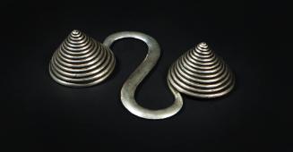 S-Shaped Counterweight, 20th Century
Miao culture; Guizhou Province, China
Silver; 6 5/8 × 4 …